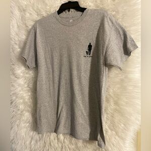 Dog Is Good NWT “Real Men Love Dogs” Men’s Short Sleeve Grey T-Shirt. Medium